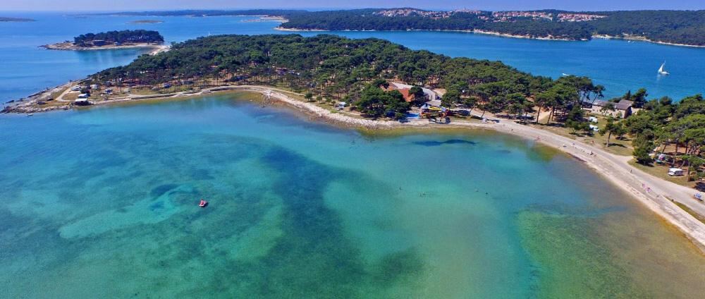 Aerial view of the coast and beaches near Medulin